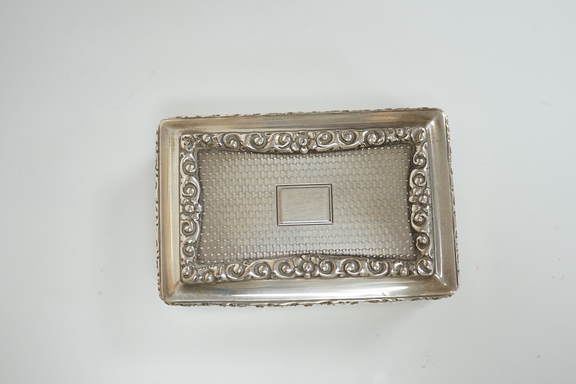 A George IV silver rectangular table snuff box, by Edward Stammers, Birmingham, 1827, 86mm, weight 159 grams. Condition - good.